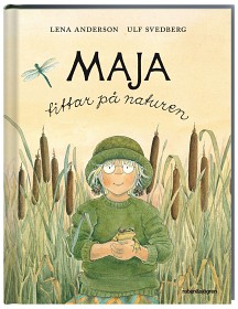 Bild på Maja tittar på naturen